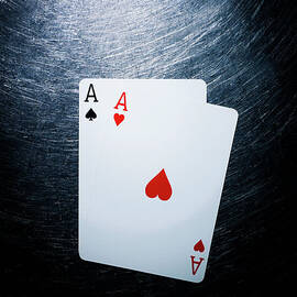 Two Aces Playing Cards On Stainless by Ballyscanlon
