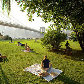 Usa, New York, People Relaxing In Park by Maremagnum