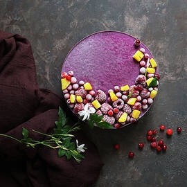 Vegan Raw Cake With Lemon, Cranberry, Raspberry And Blueberry, Banan, Cashew Cream, Coconut Butter And Coconut Milk by Julia Bogdanova