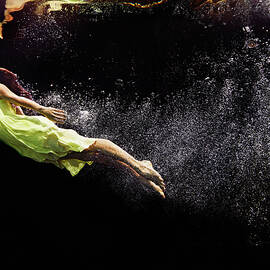 Woman In Yellow Dress Swimming To Water by Thomas Barwick