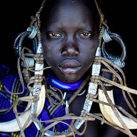Young Girl Wearing Traditional Headdress, Mursi Tribe, Mago by Enrique Lopez-tapia / Naturepl.com