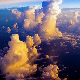 0015 Aerial View Sea of Clouds by Amyn Nasser