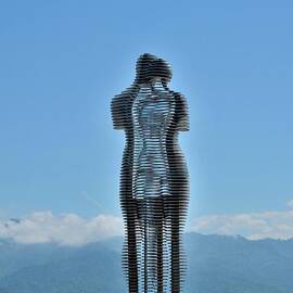 Ali and Nino love story art metal statue with mountains and sea Batumi Georgia by Imran Ahmed