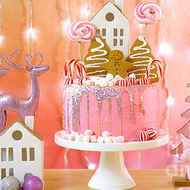 Candy land Christmas cake in pink and gold party table setting. by Milleflore Images