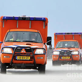 Dutch Lifeguard trucks at IJmuiden Beach by Ko Van Leeuwen