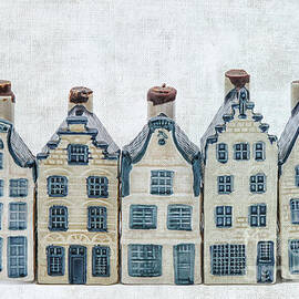 Five Delft blue houses by Patricia Hofmeester