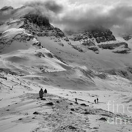 Hiking Into The Winter Storm by Adam Jewell