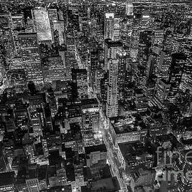 Manhattan at night in black and white by Patricia Hofmeester