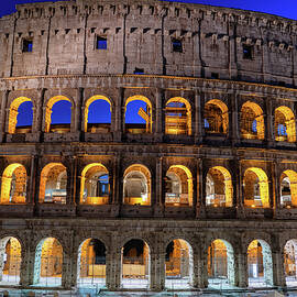 Monumental Colosseum Facade At Night by Artur Bogacki