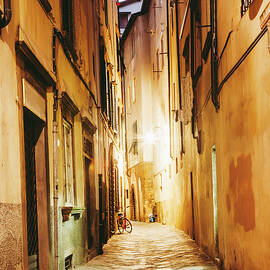A street in Lucca, Italy by Alexey Stiop
