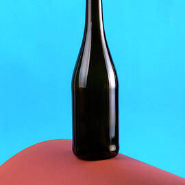 Abstract still life with color background and glass bottle by Valentin Ivantsov