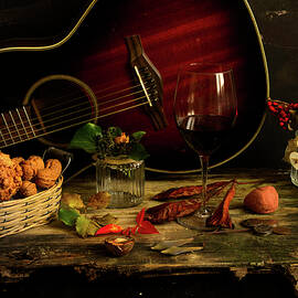 Acoustic guitar and a glass of wine by Redrumstudio Italy