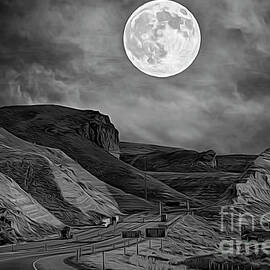 Artistic Moon Over Hwy 80 Wyoming BW  by Chuck Kuhn