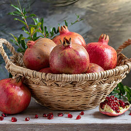  Basket with pomegranates by Manolis Tsantakis
