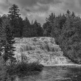 Bond Falls Dressed In Black And White by Dale Kauzlaric