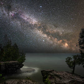 Cave Point Dreams - Milky Way over Lake Michigan at Cave Point Park by Peter Herman
