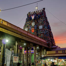 Chennai, South India - A hindu temple Dedicated to Lord Venkat Krishna, the Parthasarathy temple located at Triplicane during night with devotee worship in the building by Arpan Bhatia