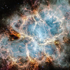 Crab Nebula via NASA James Webb Space Telescope NIRCam and MIRI Image by Carol Japp