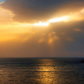 Crepuscular Rays at Sunset in Izmir, Turkey by Thomas Ly