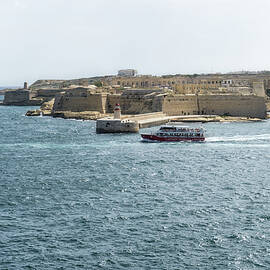 Cruising in Malta - Tourist Boat Leaving Grand Harbour at Fort Ricasoli by Georgia Mizuleva