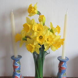 Daffodils And Candlesticks by Lesley Evered