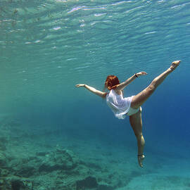 Dancing ballet underwater by Manolis Tsantakis