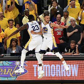 Draymond Green and Stephen Curry by Garrett Ellwood