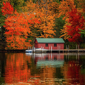 Fall's Embrace Boat House Haven by the Water by Jeff Folger