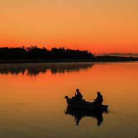 Fishermen Silhouetted At Sunrise by Dan Sproul