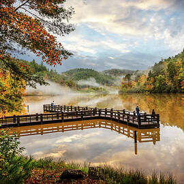 Fishing in Autumn Colors at the Lake by Debra and Dave Vanderlaan