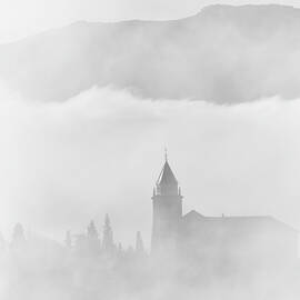 Foggy sunrise. The Alhambra Palace, Santa Maria de la Alhambra chuch. BW by Guido Montanes Castillo