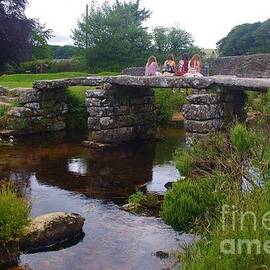 Four Friends On A Clapper Bridge - Postbridge UK by Lesley Evered