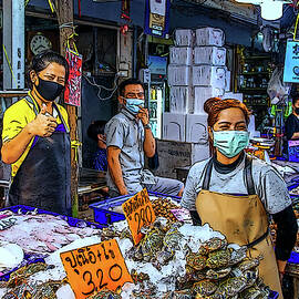 Fresh seafood for Sale at a fish market in Thailand by Wilfried Strang