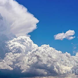 Growing Cumulus by Jon Burch Photography