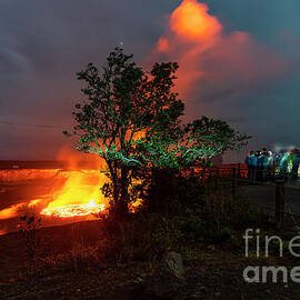 Hawaii Visitors viewing the Erupting Volcano at Night by Phillip Espinasse
