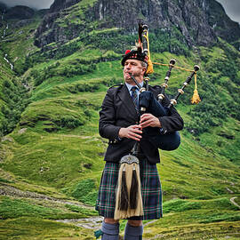 Highlands Bagpiper - Scotland by Stuart Litoff