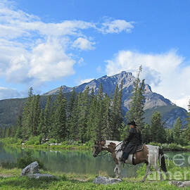 Horse and Rider in Banff National Park Alberta Canada by John Malone
