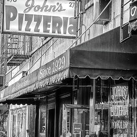 John's Famous Pizza from 1929.  Greenwich Village, Bleecker Street by Doc Braham