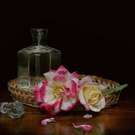 Last roses of autumn in the basket  by Loredana Gallo Migliorini