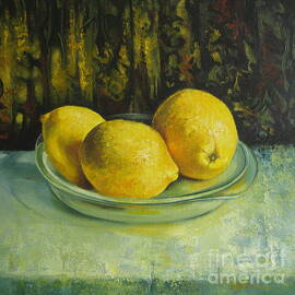 Lemons in glass plate