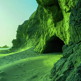 Little cave along the beach at Bandon Oregon by Jeff Swan