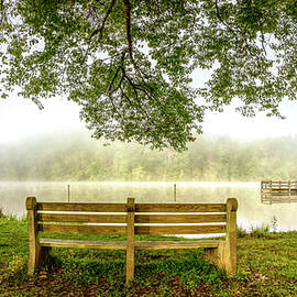 Lone Bench at the Lake by Debra and Dave Vanderlaan