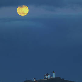 Maine Cape Nedick Nubble Light with Full Wolf Moon by Juergen Roth
