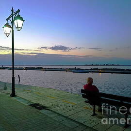 Man on bench, Lefkada by Paul Boizot