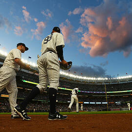 Matt Holliday and Aaron Judge by Mike Stobe