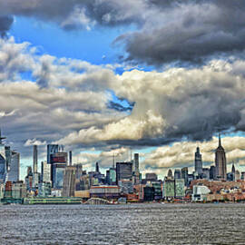 Mid-Town Manhattan Under an Awesome Sky  by Allen Beatty