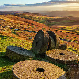 Millstones at Sunset, Stanage Edge, Peak District National Park, Derbyshire, England by Neale And Judith Clark