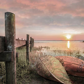 Morning Light on the Canoes by Debra and Dave Vanderlaan