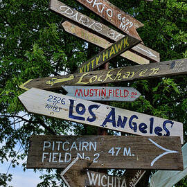 Multidirectional Wooden Signs by Paul Ward