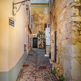 Narrow Cobblestone Alley in Antibes, France by Liesl Walsh